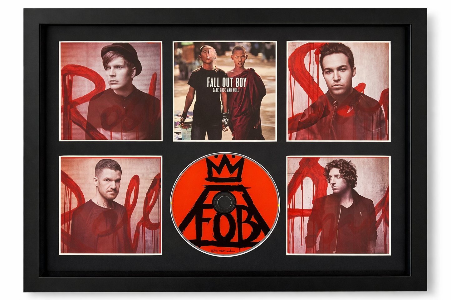 Framed collage of Fall Out Boy photos with a central disc featuring the band's logo.