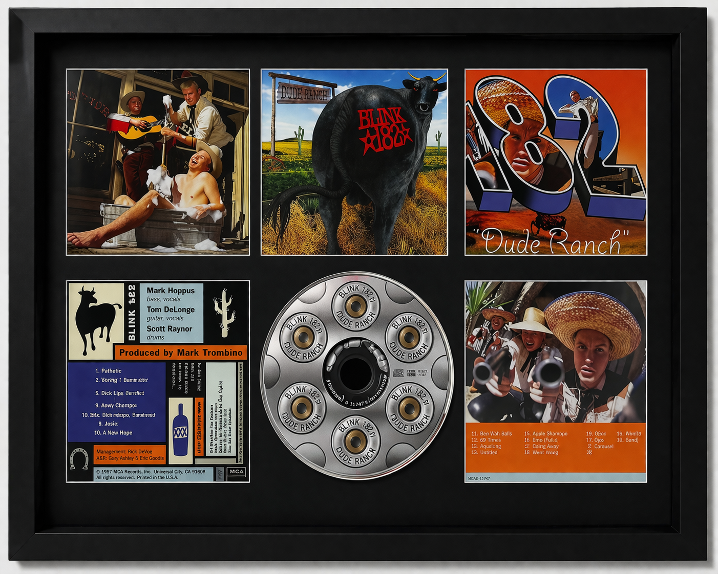 Framed collage with various images and a bullet casing display, featuring a black frame.