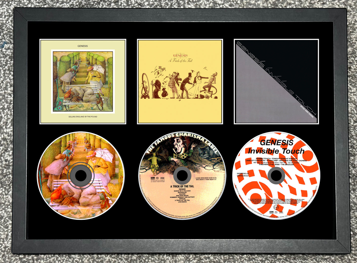 Genesis | Selling England By The.. | A Trick Of The Tail | Invisible Touch | Triple Retro Mounted CD Wall Display | Frame Not Included |