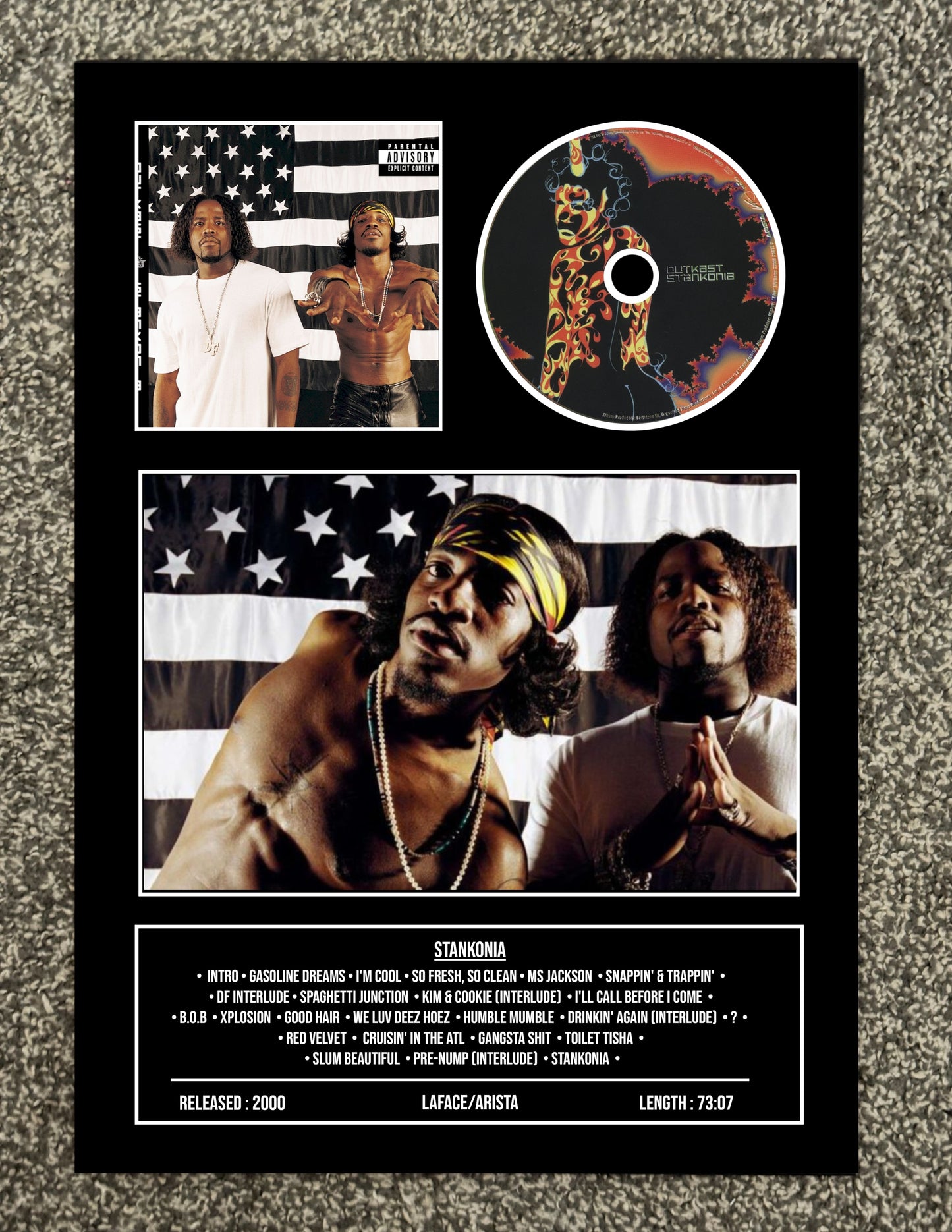CD cover with American flag design, images of people, and tracklist on a textured surface.