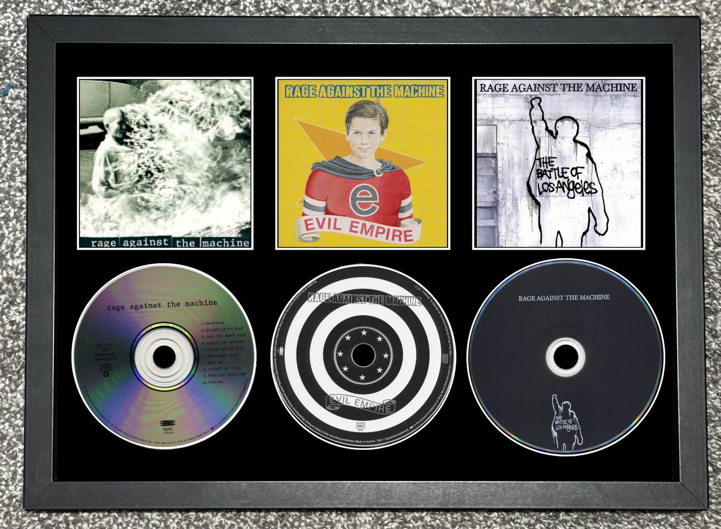 Rage Against The Machine | Rage Against The Machine | Evil Empire | The Battle Of Los Angeles | Triple CD Wall Display | Frame Not Included |