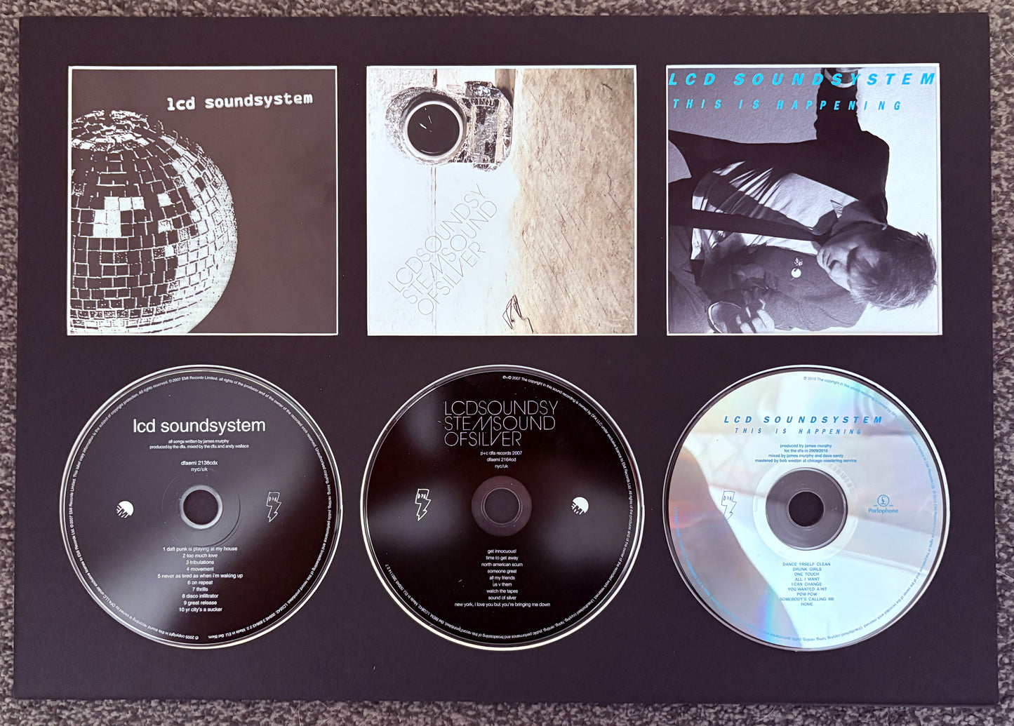 LCD Soundsystem | LCD Soundsystem | Stemsound Of Silver | This Is Happening | Retro Triple CD Wall Display | Frame Not Included |