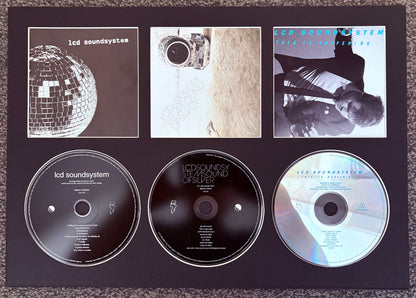 LCD Soundsystem | LCD Soundsystem | Stemsound Of Silver | This Is Happening | Retro Triple CD Wall Display | Frame Not Included |