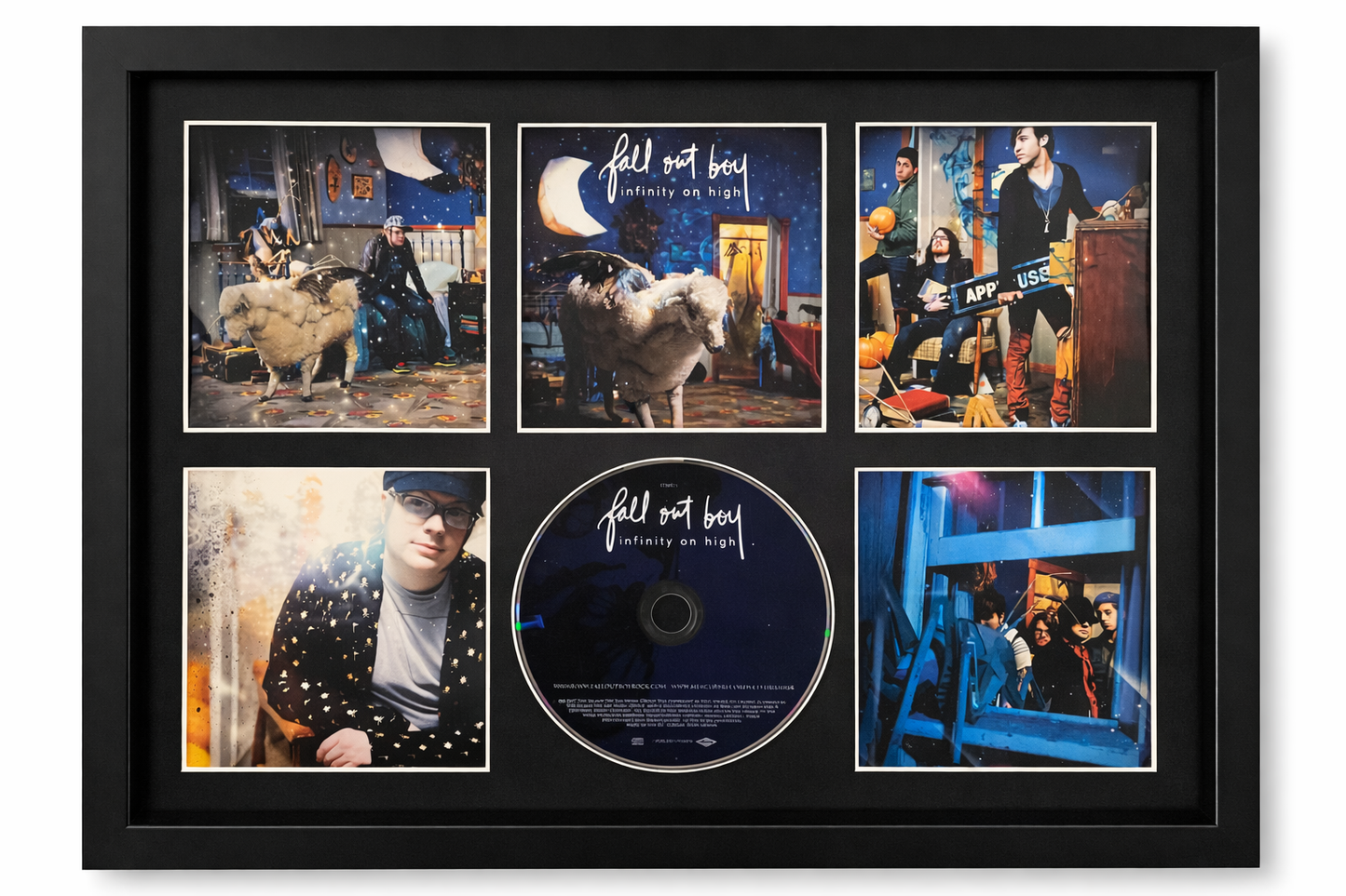 Framed music album cover with 'Fall Out Boy' and a CD disc
