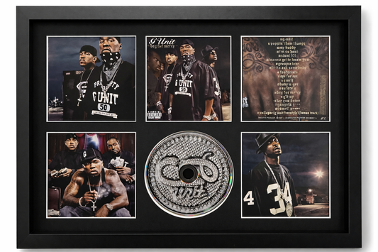 Framed collectible featuring a CD and multiple photos of a person, with text on the CD cover.