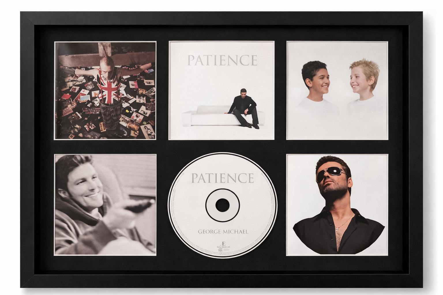 Framed display of George Michael's 'Patience' album with cover art and CD