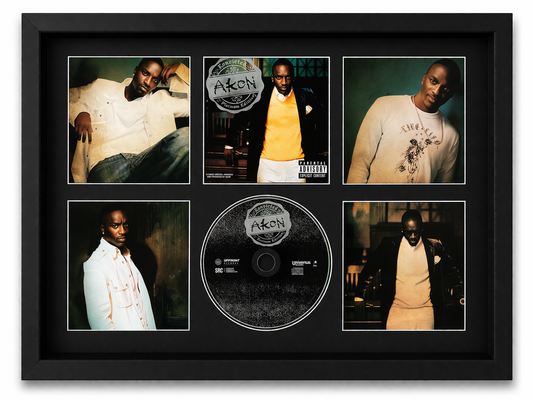 Framed collage of Akon's album cover and photos with a CD disc in the center.