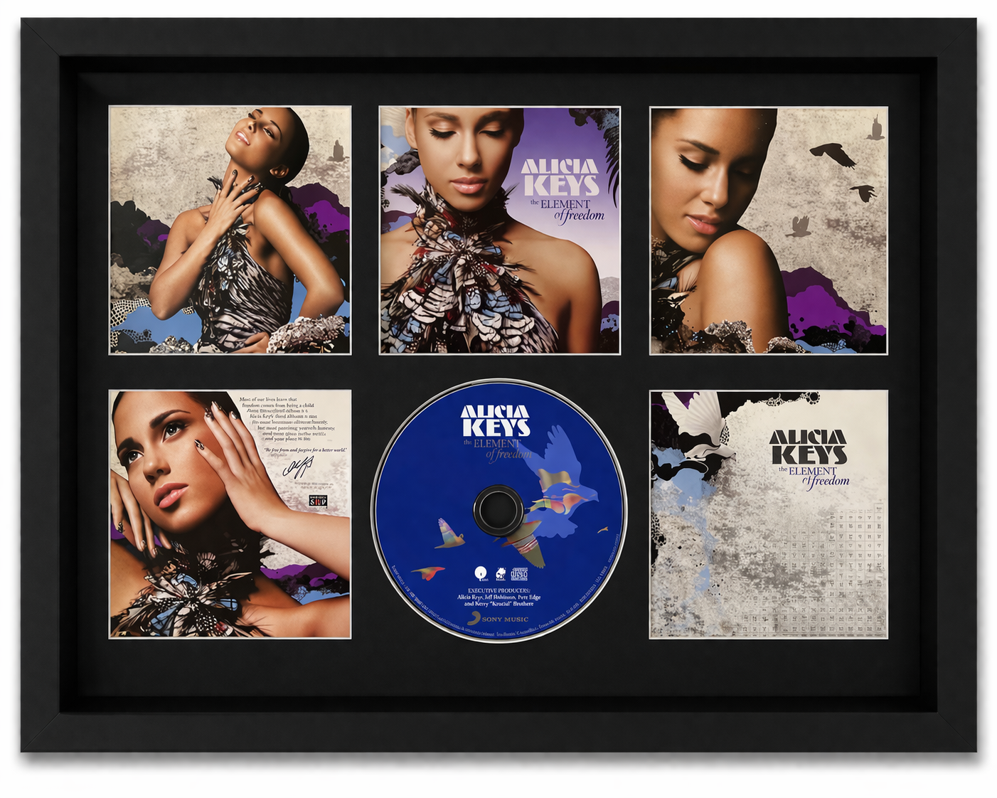 Framed album cover of Alicia Keys with a CD in the center
