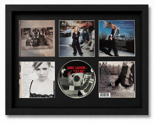 Framed Avril Lavigne 'Let Go' album with multiple images and a CD inside