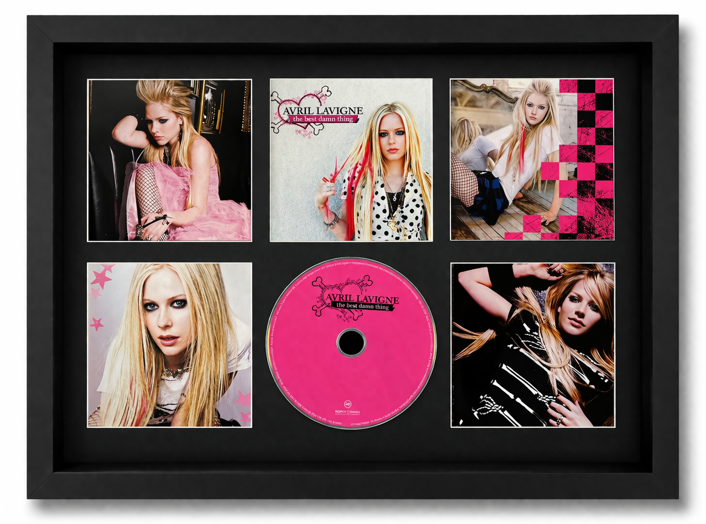 Framed display with Avril Lavigne album cover and CD