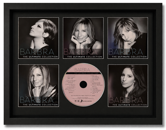 Framed album cover of 'Barbra: The Ultimate Collection' with black and white portraits and a pink CD.