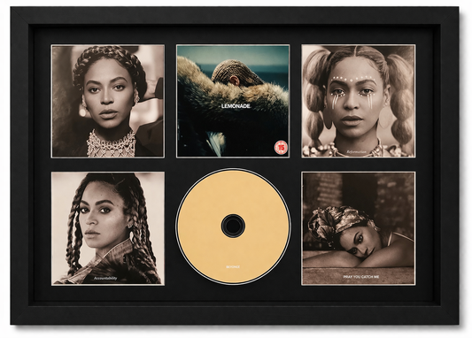 Framed Beyoncé album cover with a gold disc in the center
