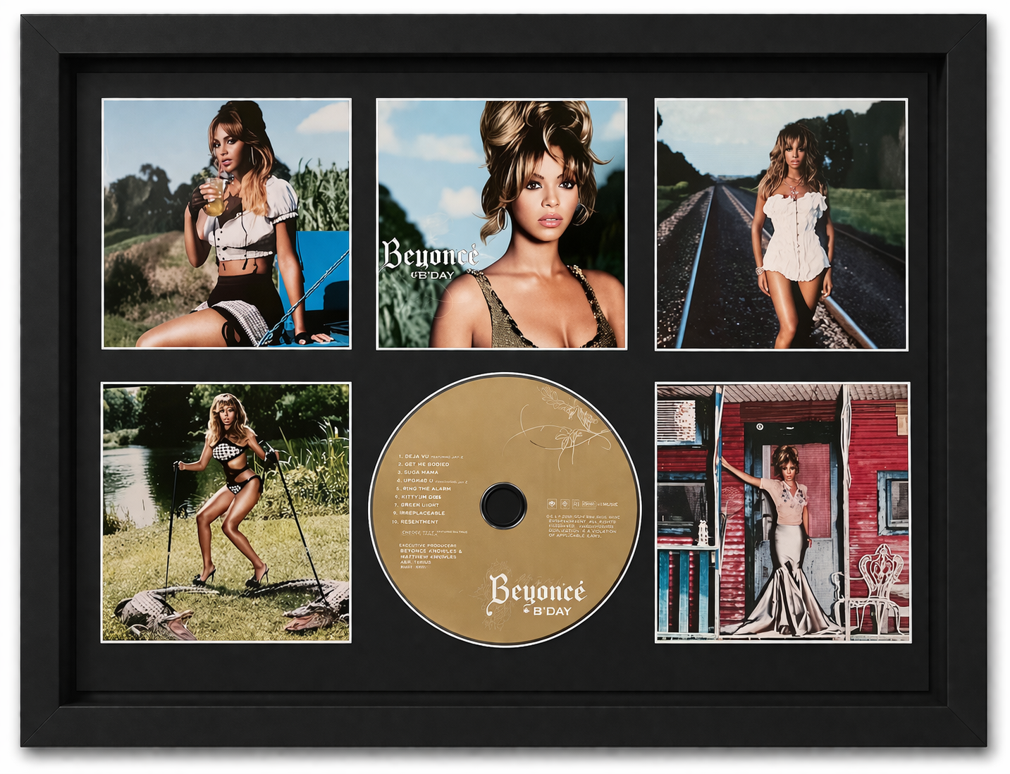 Framed Beyoncé album cover with multiple photos and a gold disc inside