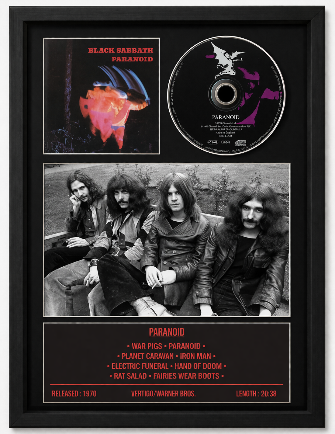 Framed album cover of Black Sabbath's 'Paranoid' with CD and band photo.