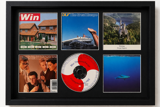 Framed display of George Michael's 'Patience' album with cover art and CD