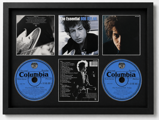 Framed album cover of 'The Essential Bob Dylan' with Columbia records on a black background
