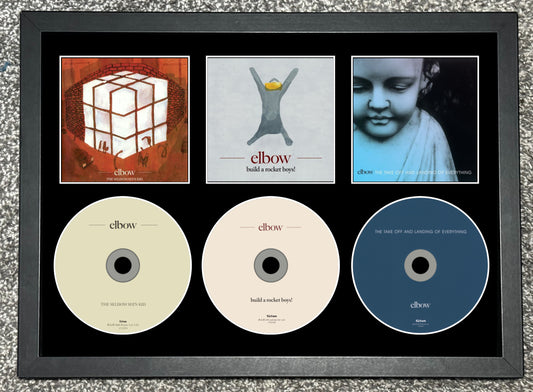 Elbow | The Seldom Seen Kid | Built A Rocket Boys!  | The Take Off And Landing.... | Retro Triple CD Wall Display | Frame Not Included |